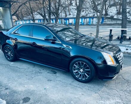 Черный Кадиллак СТС, объемом двигателя 3 л и пробегом 240 тыс. км за 8800 $, фото 1 на Automoto.ua