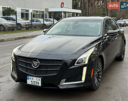 Черный Кадиллак СТС, объемом двигателя 2 л и пробегом 189 тыс. км за 9999 $, фото 1 на Automoto.ua