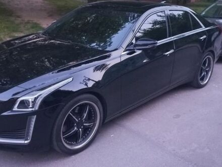 Чорний Каділак CTS, об'ємом двигуна 2 л та пробігом 300 тис. км за 13200 $, фото 1 на Automoto.ua