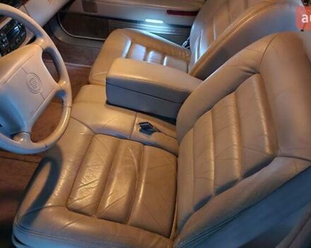 Белый Кадиллак ДеВиль, объемом двигателя 4.6 л и пробегом 92 тыс. км за 17000 $, фото 11 на Automoto.ua