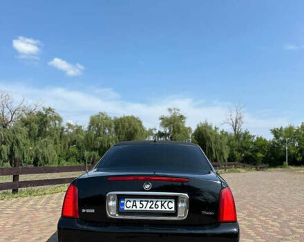 Черный Кадиллак ДеВиль, объемом двигателя 4.57 л и пробегом 150 тыс. км за 6555 $, фото 3 на Automoto.ua