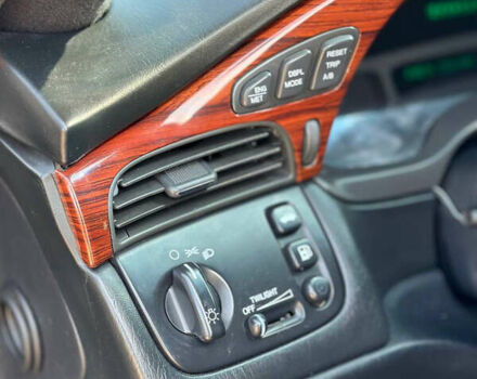 Черный Кадиллак ДеВиль, объемом двигателя 4.57 л и пробегом 150 тыс. км за 6555 $, фото 19 на Automoto.ua