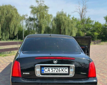 Черный Кадиллак ДеВиль, объемом двигателя 4.57 л и пробегом 150 тыс. км за 6555 $, фото 5 на Automoto.ua