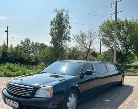 Черный Кадиллак ДеВиль, объемом двигателя 4.57 л и пробегом 150 тыс. км за 6555 $, фото 1 на Automoto.ua