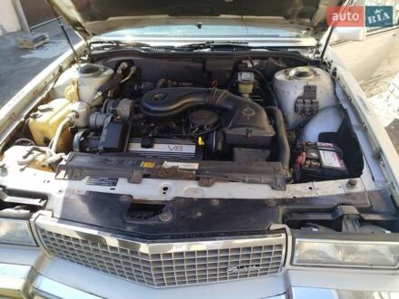 Серый Кадиллак ДеВиль, объемом двигателя 4.5 л и пробегом 86 тыс. км за 14000 $, фото 1 на Automoto.ua