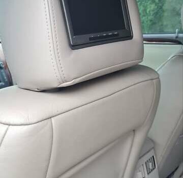 Чорний Каділак DTS, об'ємом двигуна 4.57 л та пробігом 117 тис. км за 9900 $, фото 12 на Automoto.ua