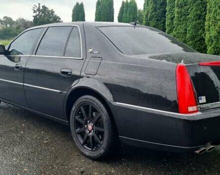 Чорний Каділак DTS, об'ємом двигуна 4.57 л та пробігом 117 тис. км за 9900 $, фото 3 на Automoto.ua