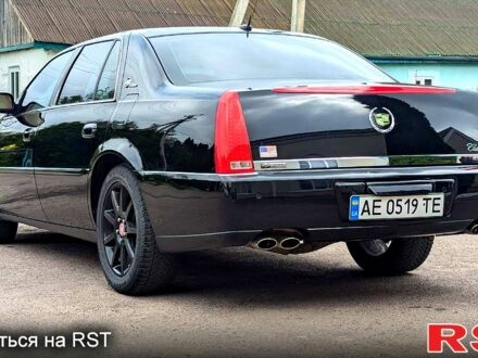 Каділак DTS 2006 у Рівному на Automoto.ua Чорний Каділак DTS, об'ємом двигуна 4.6 л та пробігом 120 тис. км за 9800 $, фото 1 на Automoto.ua