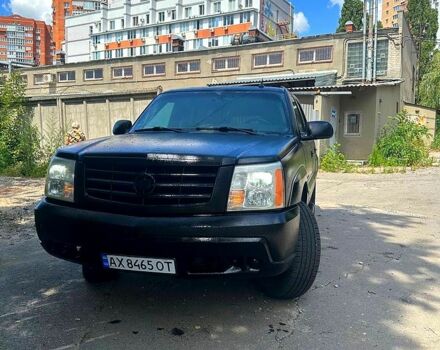 Черный Кадиллак Эскалейд, объемом двигателя 6 л и пробегом 100 тыс. км за 13200 $, фото 2 на Automoto.ua