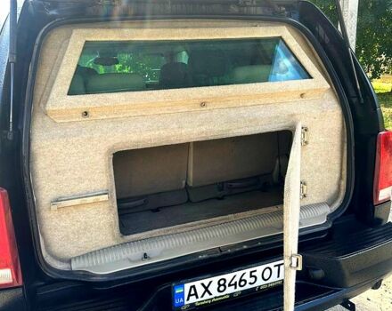 Черный Кадиллак Эскалейд, объемом двигателя 6 л и пробегом 100 тыс. км за 13200 $, фото 5 на Automoto.ua