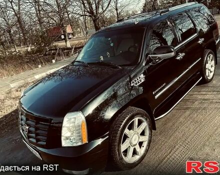 Чорний Каділак Ескалейд, об'ємом двигуна 6.2 л та пробігом 222 тис. км за 19999 $, фото 1 на Automoto.ua