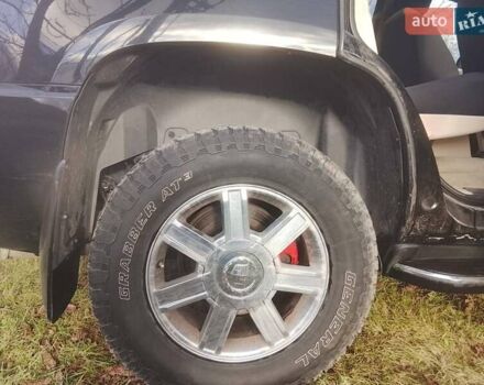 Черный Кадиллак Эскалейд, объемом двигателя 6.2 л и пробегом 230 тыс. км за 8900 $, фото 1 на Automoto.ua