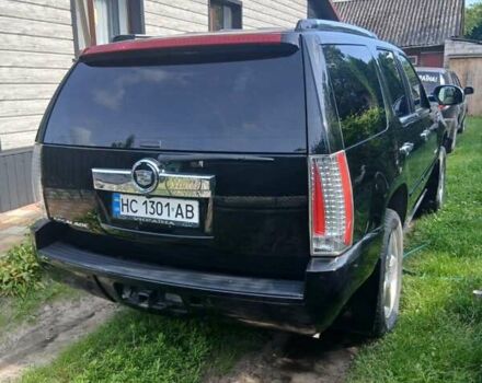 Чорний Каділак Ескалейд, об'ємом двигуна 6.2 л та пробігом 115 тис. км за 12500 $, фото 6 на Automoto.ua