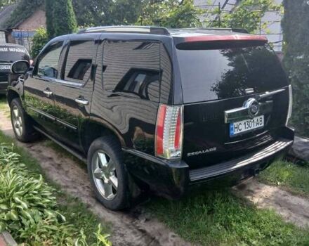 Чорний Каділак Ескалейд, об'ємом двигуна 6.2 л та пробігом 115 тис. км за 12500 $, фото 8 на Automoto.ua
