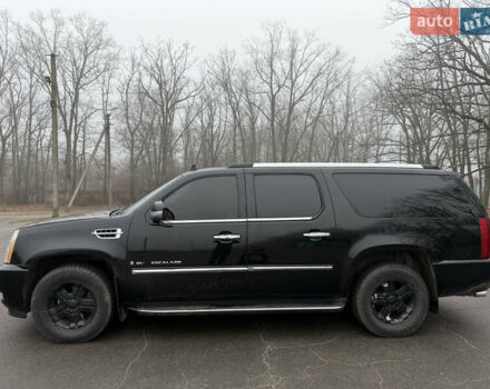 Чорний Каділак Ескалейд, об'ємом двигуна 6.2 л та пробігом 250 тис. км за 14000 $, фото 9 на Automoto.ua