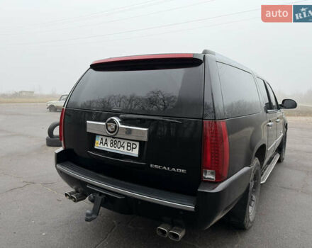 Чорний Каділак Ескалейд, об'ємом двигуна 6.2 л та пробігом 250 тис. км за 14000 $, фото 12 на Automoto.ua