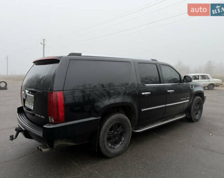 Чорний Каділак Ескалейд, об'ємом двигуна 6.2 л та пробігом 250 тис. км за 14000 $, фото 11 на Automoto.ua