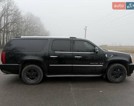 Чорний Каділак Ескалейд, об'ємом двигуна 6.2 л та пробігом 250 тис. км за 14000 $, фото 4 на Automoto.ua