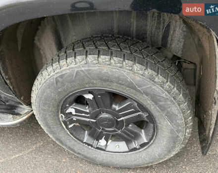 Чорний Каділак Ескалейд, об'ємом двигуна 6.2 л та пробігом 250 тис. км за 14000 $, фото 24 на Automoto.ua