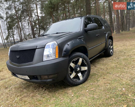 Чорний Каділак Ескалейд, об'ємом двигуна 6.2 л та пробігом 180 тис. км за 12000 $, фото 31 на Automoto.ua