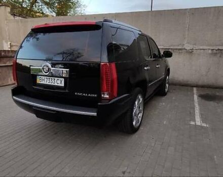 Чорний Каділак Ескалейд, об'ємом двигуна 6.2 л та пробігом 143 тис. км за 21800 $, фото 2 на Automoto.ua