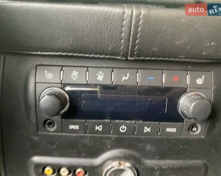 Кадиллак Эскалейд 2008 в Днепре (Днепропетровске) на Automoto.ua Черный Кадиллак Эскалейд, объемом двигателя 6 л и пробегом 154 тыс. км за 20000 $, фото 2 на Automoto.ua