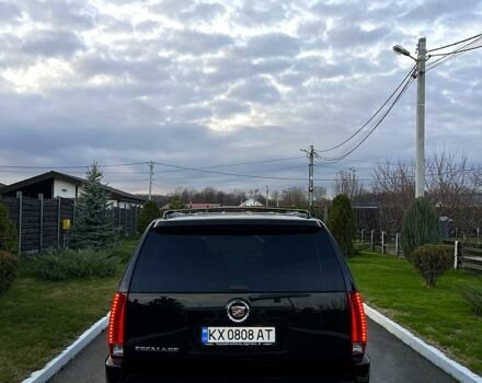 Чорний Каділак Ескалейд, об'ємом двигуна 6.2 л та пробігом 156 тис. км за 15000 $, фото 2 на Automoto.ua