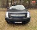 Чорний Каділак Ескалейд, об'ємом двигуна 6.2 л та пробігом 180 тис. км за 12000 $, фото 2 на Automoto.ua