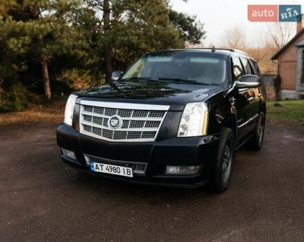Чорний Каділак Ескалейд, об'ємом двигуна 6.16 л та пробігом 250 тис. км за 26999 $, фото 2 на Automoto.ua