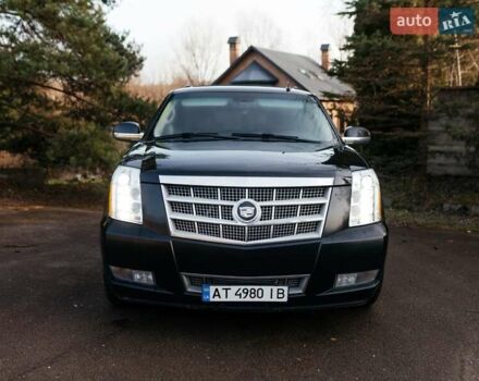 Чорний Каділак Ескалейд, об'ємом двигуна 6.16 л та пробігом 250 тис. км за 26999 $, фото 3 на Automoto.ua