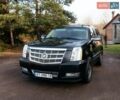 Чорний Каділак Ескалейд, об'ємом двигуна 6.16 л та пробігом 250 тис. км за 26999 $, фото 1 на Automoto.ua