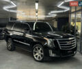 Чорний Каділак Ескалейд, об'ємом двигуна 6.16 л та пробігом 183 тис. км за 33900 $, фото 1 на Automoto.ua