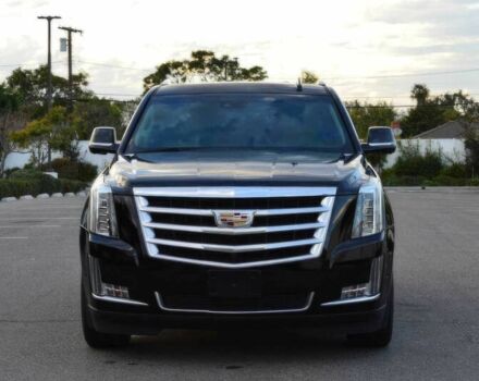 Чорний Каділак Ескалейд, об'ємом двигуна 6.2 л та пробігом 59 тис. км за 5600 $, фото 1 на Automoto.ua