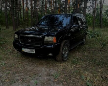 Чорний Каділак Ескалейд, об'ємом двигуна 5 л та пробігом 220 тис. км за 5700 $, фото 1 на Automoto.ua