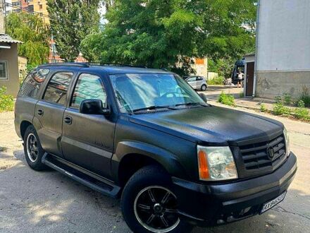 Черный Кадиллак Эскалейд, объемом двигателя 6 л и пробегом 100 тыс. км за 13200 $, фото 1 на Automoto.ua