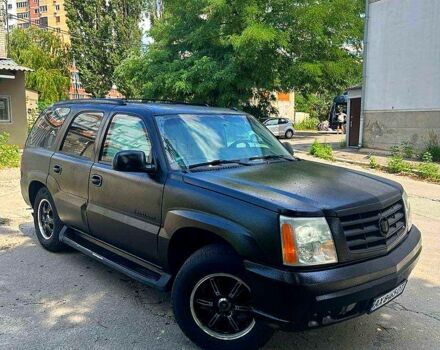 Чорний Каділак Ескалейд, об'ємом двигуна 6 л та пробігом 100 тис. км за 13200 $, фото 1 на Automoto.ua