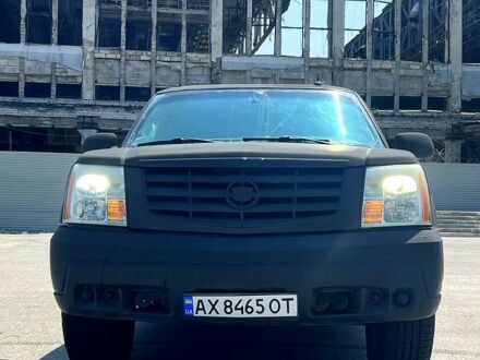 Чорний Каділак Ескалейд, об'ємом двигуна 6 л та пробігом 80 тис. км за 17999 $, фото 1 на Automoto.ua