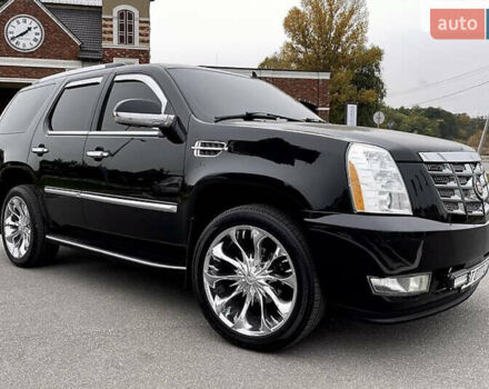 Чорний Каділак Ескалейд, об'ємом двигуна 6.2 л та пробігом 218 тис. км за 14500 $, фото 1 на Automoto.ua