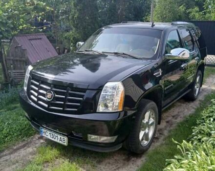 Чорний Каділак Ескалейд, об'ємом двигуна 6.2 л та пробігом 115 тис. км за 12500 $, фото 1 на Automoto.ua