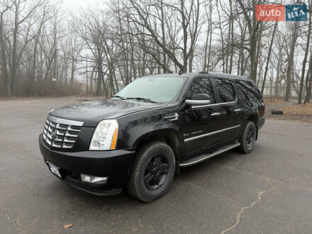 Чорний Каділак Ескалейд, об'ємом двигуна 6.2 л та пробігом 250 тис. км за 14000 $, фото 1 на Automoto.ua