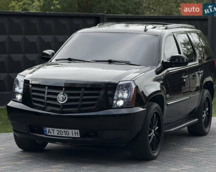 Чорний Каділак Ескалейд, об'ємом двигуна 6.2 л та пробігом 211 тис. км за 16000 $, фото 1 на Automoto.ua