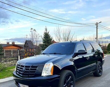 Чорний Каділак Ескалейд, об'ємом двигуна 6.2 л та пробігом 156 тис. км за 15000 $, фото 1 на Automoto.ua