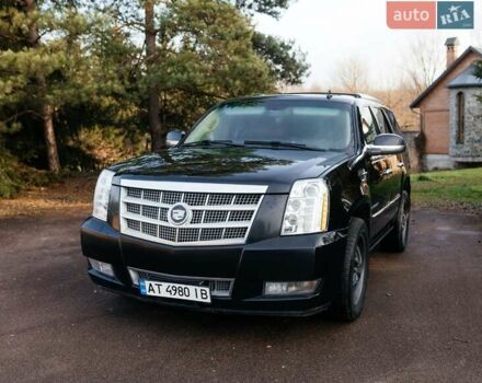 Чорний Каділак Ескалейд, об'ємом двигуна 6.16 л та пробігом 250 тис. км за 26999 $, фото 1 на Automoto.ua