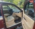 Червоний Каділак Ескалейд, об'ємом двигуна 6.2 л та пробігом 174 тис. км за 19800 $, фото 4 на Automoto.ua