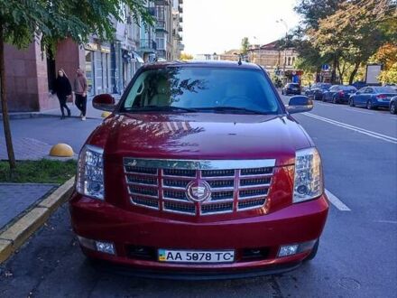 Красный Кадиллак Эскалейд, объемом двигателя 6.2 л и пробегом 183 тыс. км за 18000 $, фото 1 на Automoto.ua