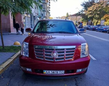 Червоний Каділак Ескалейд, об'ємом двигуна 6.2 л та пробігом 183 тис. км за 18000 $, фото 1 на Automoto.ua