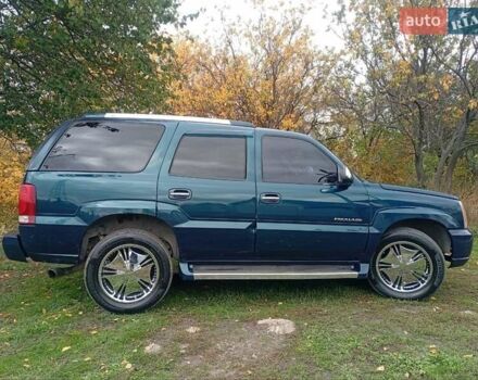 Зелений Каділак Ескалейд, об'ємом двигуна 6 л та пробігом 160 тис. км за 15000 $, фото 7 на Automoto.ua