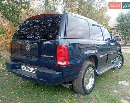 Зелений Каділак Ескалейд, об'ємом двигуна 6 л та пробігом 160 тис. км за 15000 $, фото 3 на Automoto.ua