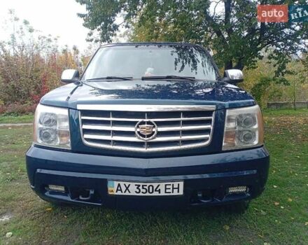 Зелений Каділак Ескалейд, об'ємом двигуна 6 л та пробігом 160 тис. км за 15000 $, фото 5 на Automoto.ua