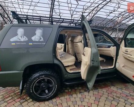 Зеленый Кадиллак Эскалейд, объемом двигателя 6.2 л и пробегом 252 тыс. км за 15000 $, фото 1 на Automoto.ua